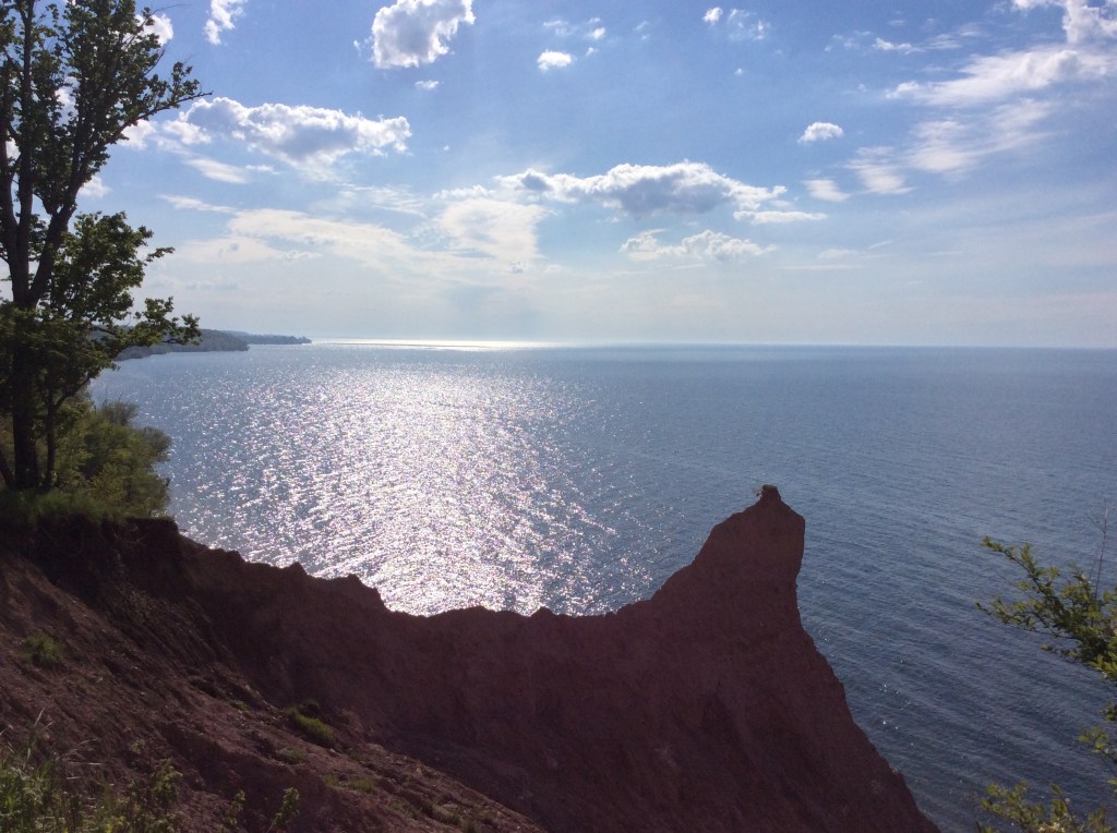 Sun shines over Lake Ontario from Scott's Bluffs